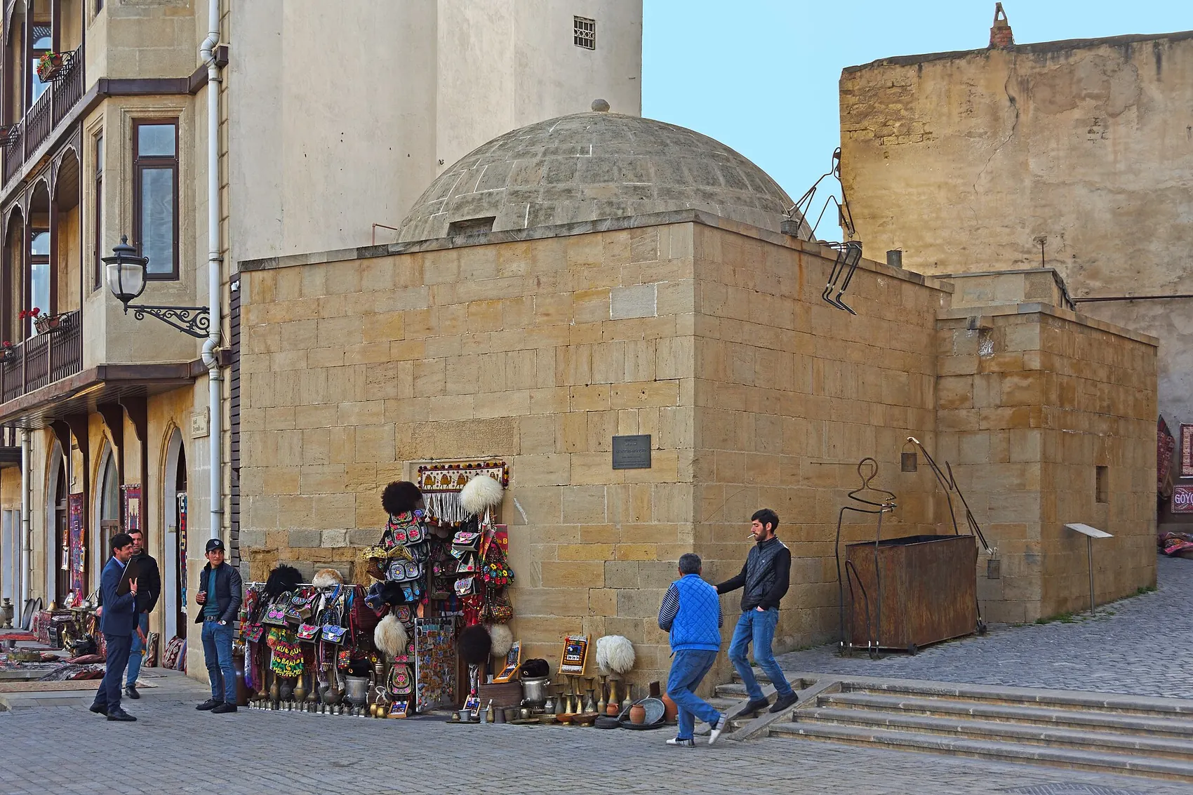 The school-mosque and trade by the wall