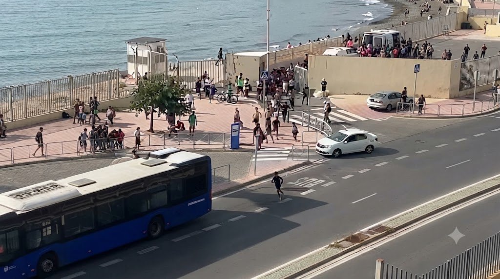 Migrants arriving at the border of the Spanish exclave of Ceuta