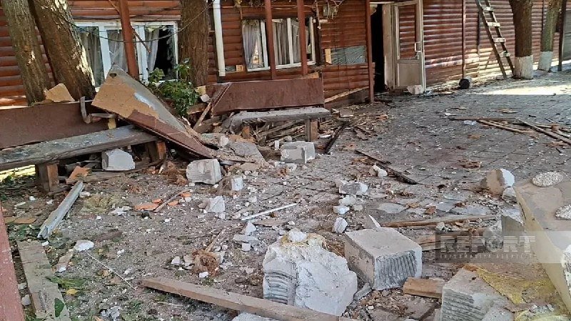 Destroyed restaurant building after a drone attack