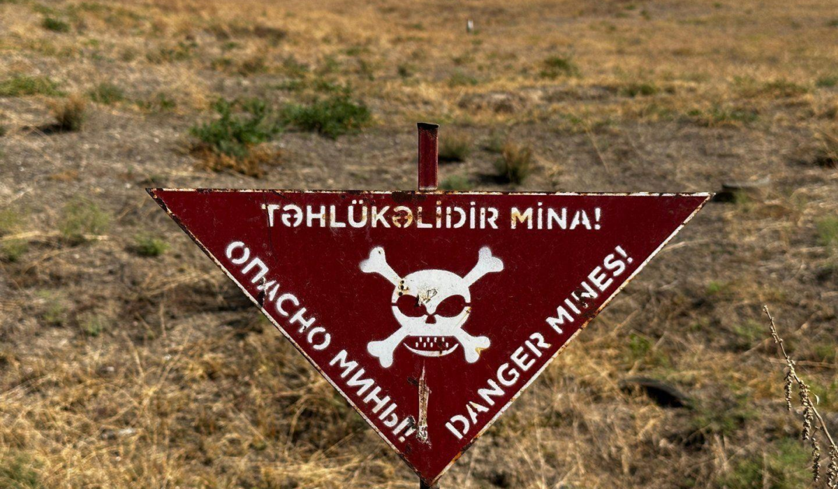 Demining activities and landmine warning sign in liberated territory