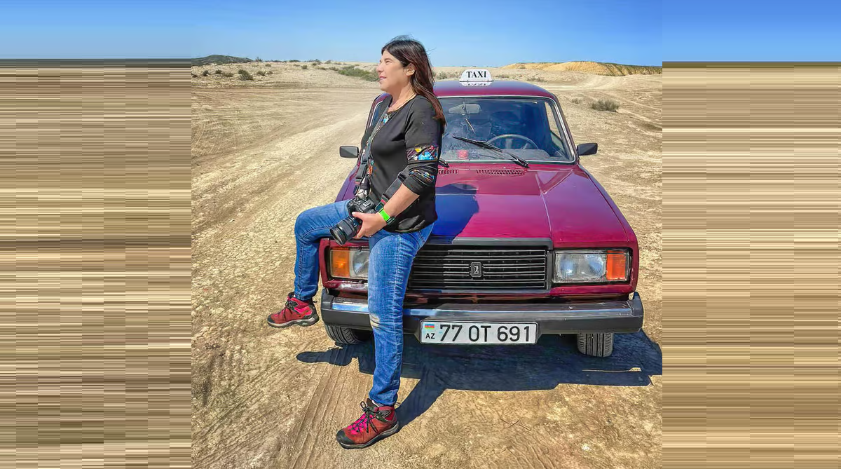 Photographer overlooking mountain village of Khinalig in Azerbaijan