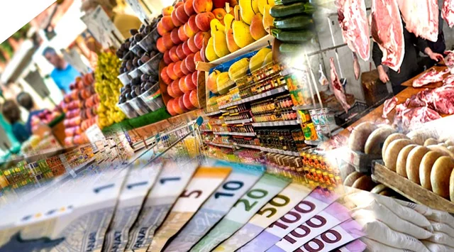 A calculator, inflation charts, and Azerbaijani manats