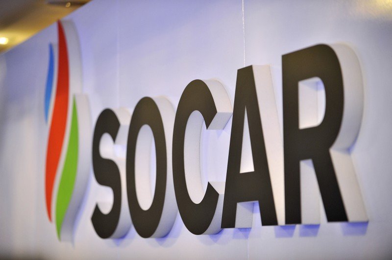 SOCAR company logo against the backdrop of an industrial facility