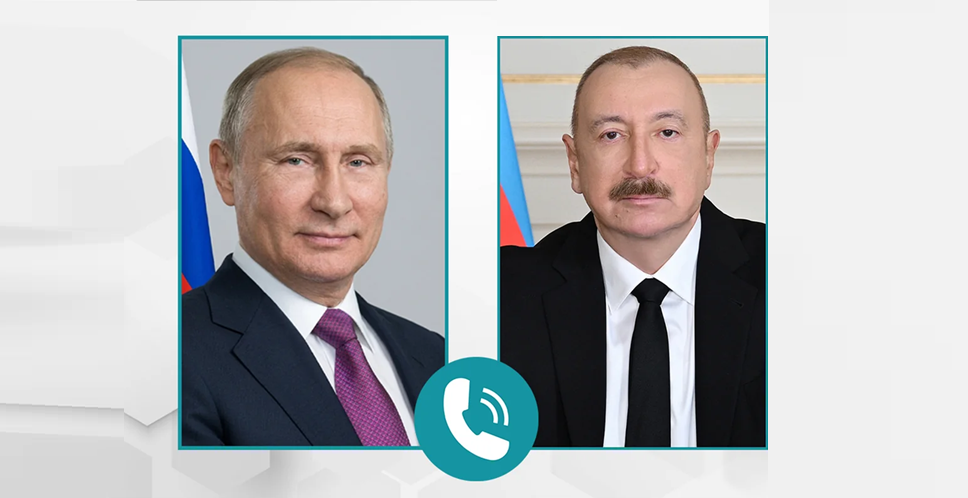 Official portraits of Russian President Vladimir Putin and Azerbaijani President Ilham Aliyev